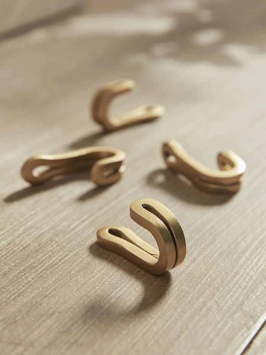 Four Small Brass Hooks
