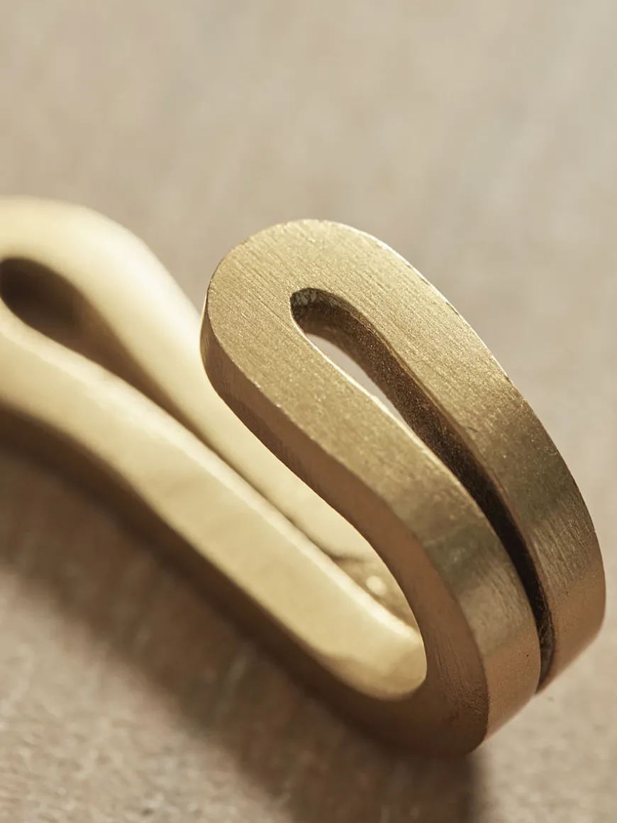 Four Small Brass Hooks