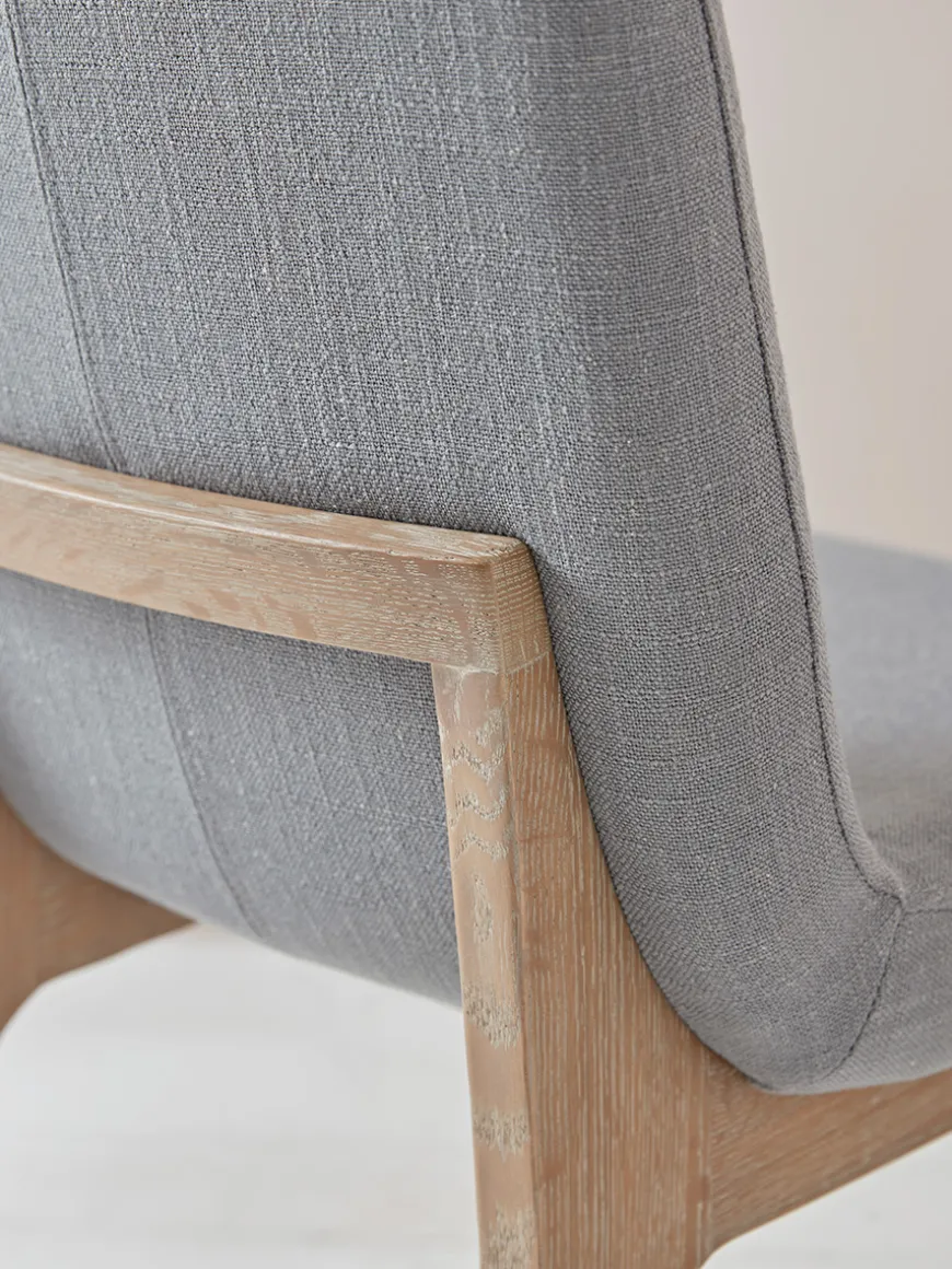 Two Manila Dining Chairs