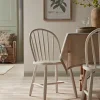 Two White Spindleback Dining Chairs
