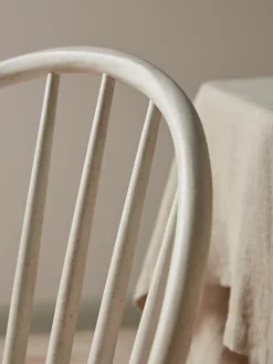 Two White Spindleback Dining Chairs