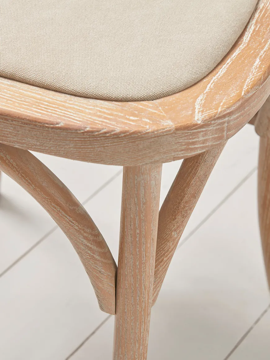 Two Wooden Cross Back Chairs