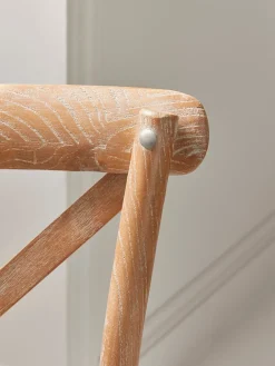 Two Wooden Cross Back Chairs